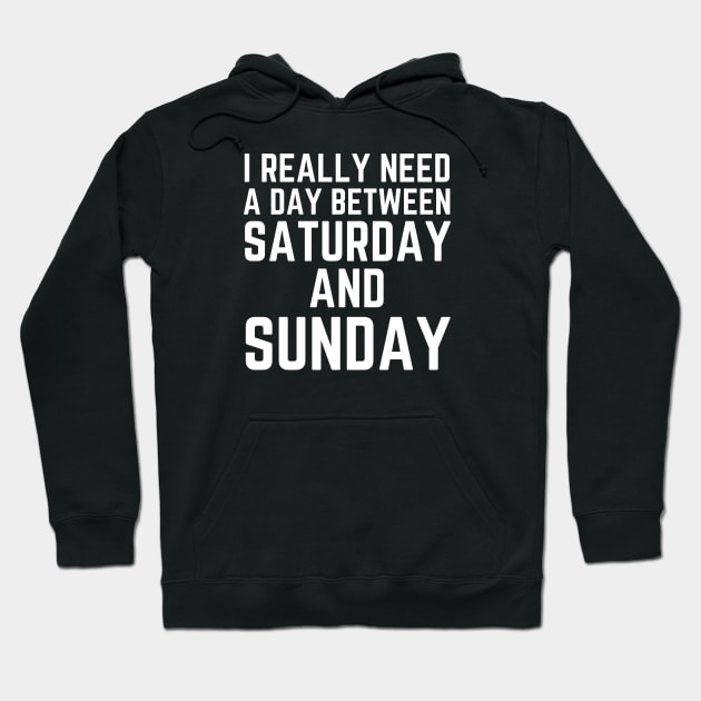 I Really Need A Day Between Saturday And Sunday Hoodie by HobbyAndArt